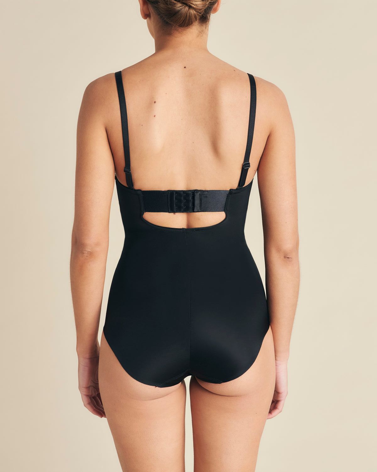 Black Strapless Slimming Bodysuit by SPANX